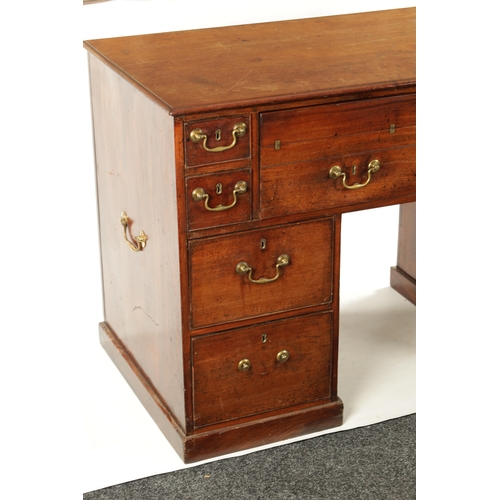 162 - A GEORGE III MAHOGANY LIBRARY DESK with fall forward top secretaire drawer having adjustable writing... 