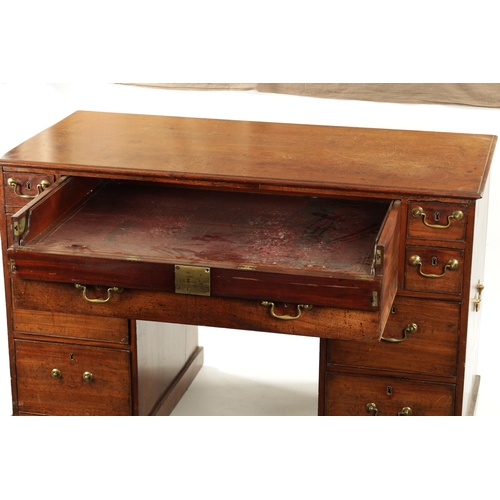 162 - A GEORGE III MAHOGANY LIBRARY DESK with fall forward top secretaire drawer having adjustable writing... 