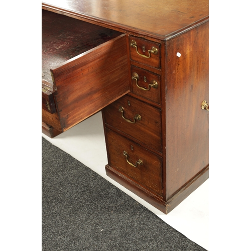 162 - A GEORGE III MAHOGANY LIBRARY DESK with fall forward top secretaire drawer having adjustable writing... 