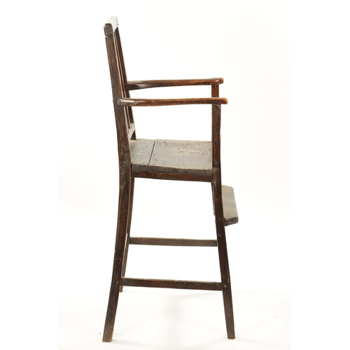 165 - A PRIMITIVE 18TH CENTURY CHILDS FRUITWOOD SPLAT BACK HIGH CHAIR with foot rest and tapering sqaure l... 