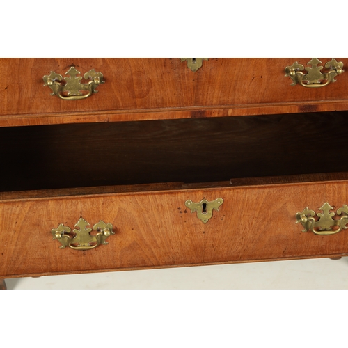 169 - AN 18TH CENTURY FIGURED MAHOGANY BOMBE SHAPED CHEST OF DRAWERS with brushing slide above two small a... 