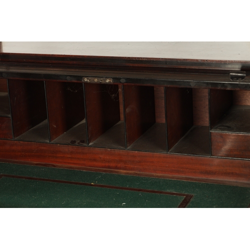 171 - A REGENCY FIGURED MAHOGANY AND EBONY STRUNG TAMBOUR FRONT CYLINDER DESK with raised top section abov... 