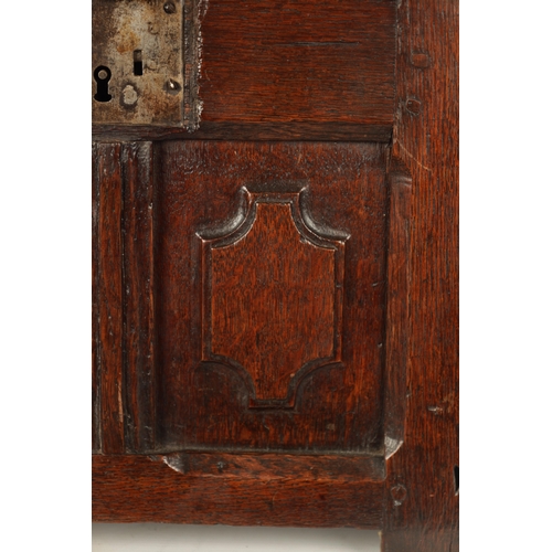 177 - A RARE 17TH CENTURY MINIATURE OAK COFFER with cross-banded moulded top above a double-panelled shape... 