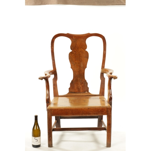 179 - A LARGE EARLY 18TH CENTURY WALNUT SPLAT BACK COUNTRY ARMCHAIR with solid seat and square moulded leg... 