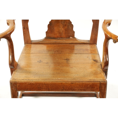 179 - A LARGE EARLY 18TH CENTURY WALNUT SPLAT BACK COUNTRY ARMCHAIR with solid seat and square moulded leg... 