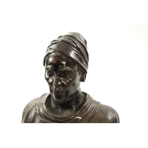 18 - A LIFE SIZE PATINATED BRONZE BUST OF TURK having brown patination (64cm high 51cm wide)