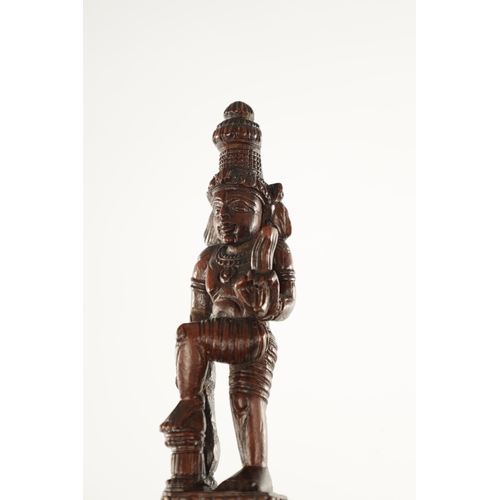 184 - AN EARLY 20TH CENTURY INDIAN CARVED HARDWOOD CANE WITH CARVED GODESS HANDLE (110cm high)