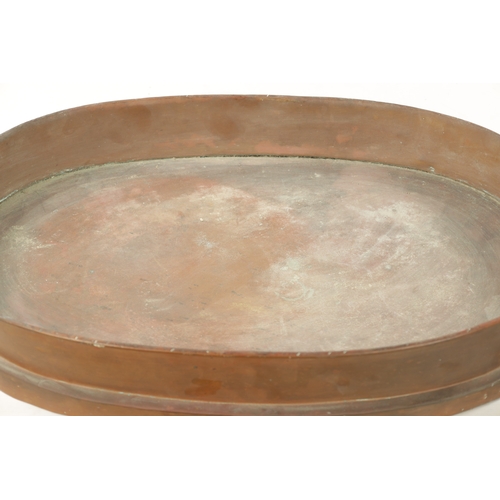 186 - A 19TH CENTURY OVAL COPPER FISH KETTLE LID (71cm wide 40cm deep)