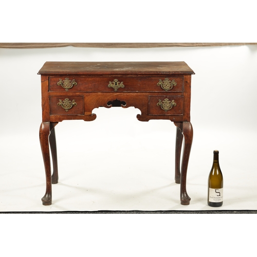 187 - A MID 18TH CENTURY MAHOGANY LOWBOY with three frieze drawers and shaped apron; raised on cabriole le... 