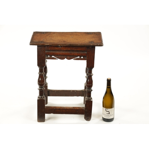 192 - A 17TH CENTURY OAK JOINT STOOL with chip carved pegged top above a shaped frieze and ring turned leg... 