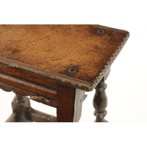 192 - A 17TH CENTURY OAK JOINT STOOL with chip carved pegged top above a shaped frieze and ring turned leg... 