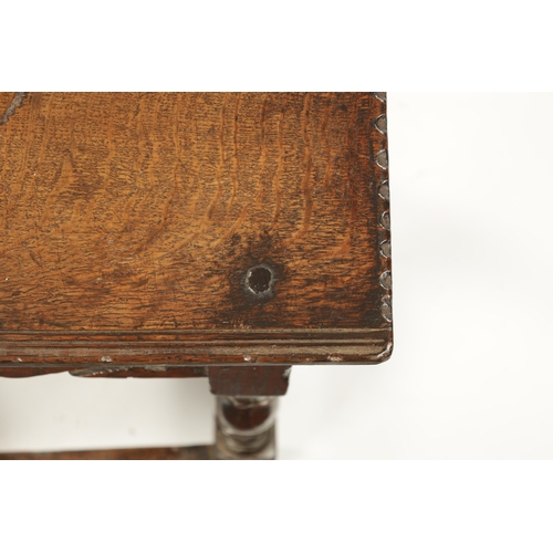 192 - A 17TH CENTURY OAK JOINT STOOL with chip carved pegged top above a shaped frieze and ring turned leg... 