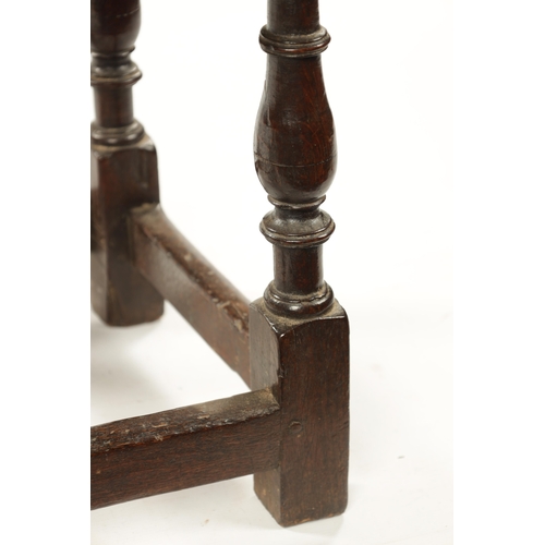 192 - A 17TH CENTURY OAK JOINT STOOL with chip carved pegged top above a shaped frieze and ring turned leg... 