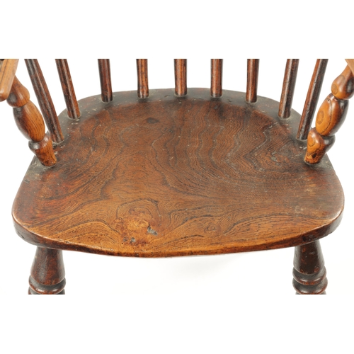 195 - AN 18TH CENTURY ASH AND ELM CHILDS WINDSOR CHAIR with spindle back and ring turned front legs (58cm ... 