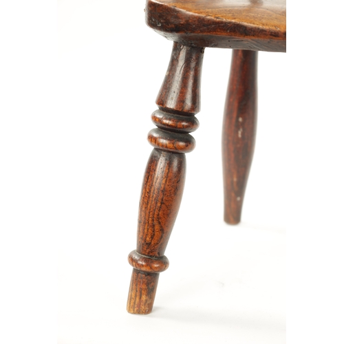 195 - AN 18TH CENTURY ASH AND ELM CHILDS WINDSOR CHAIR with spindle back and ring turned front legs (58cm ... 