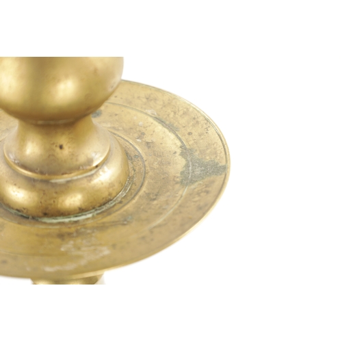 202 - A LARGE PAIR OF 18TH CENTURY BRASS CANDLESTICKS of rippled baluster form and centre drip trays