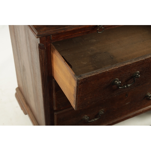 207 - AN 18TH CENTURY COUNTRY HOUSE OAK CHEST OF DRAWERS with brushing slide, fluted canted corners and th... 