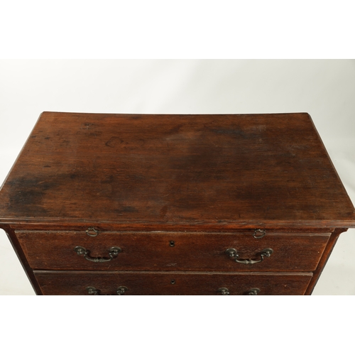 207 - AN 18TH CENTURY COUNTRY HOUSE OAK CHEST OF DRAWERS with brushing slide, fluted canted corners and th... 