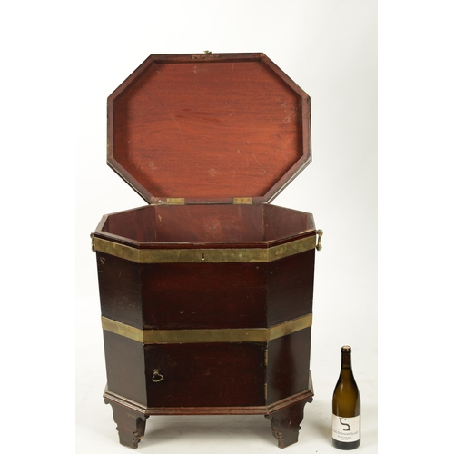 209 - A RARE GEORGE III MAHOGANY OCTAGONAL TOP BRASS BOUND WINE COOLER with cupboard base and shaped brack... 