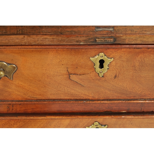 21 - A SMALL GEROGE III FIGURED MAHOGANY BACHELORS CHEST with fold over top above a bank of four drawers ... 