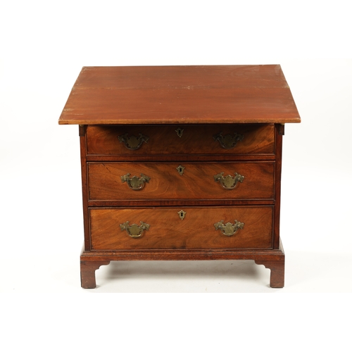 21 - A SMALL GEROGE III FIGURED MAHOGANY BACHELORS CHEST with fold over top above a bank of four drawers ... 