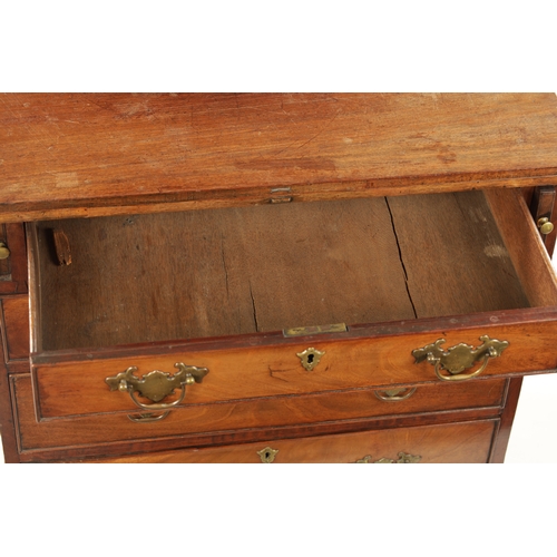 21 - A SMALL GEROGE III FIGURED MAHOGANY BACHELORS CHEST with fold over top above a bank of four drawers ... 