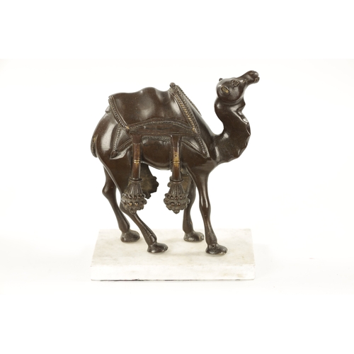 210 - AN EARLY 20TH CENTURY BRONZE SCULPTURE OF A CAMEL mounted on a marble base. (24cm high 21cm wide)