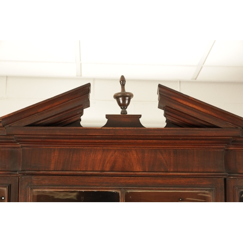 218 - A RARE SMALL SIZED GEORGE II MAHOGANY BREAKFRONT LIBRARY BOOKCASE with architectural pediment above ... 