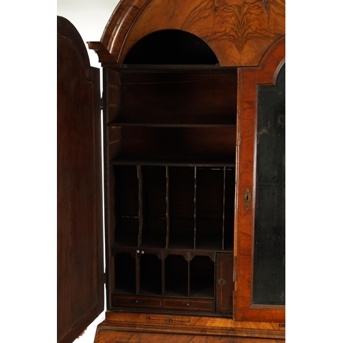 219 - AN EARLY 18TH CENTURY FIGURED WALNUT AND OAK BREAK ARCHED TOP BUREAU BOOKCASE the double arched mirr... 