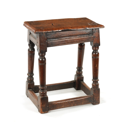 22 - A 17TH CENTURY AND LATER OAK JOINT STOOL WITH POLLARD OAK BURR TOP raised on ring turned supports jo... 