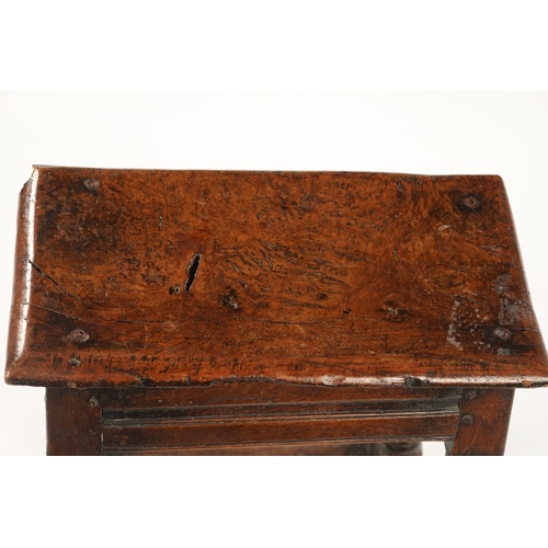 22 - A 17TH CENTURY AND LATER OAK JOINT STOOL WITH POLLARD OAK BURR TOP raised on ring turned supports jo... 