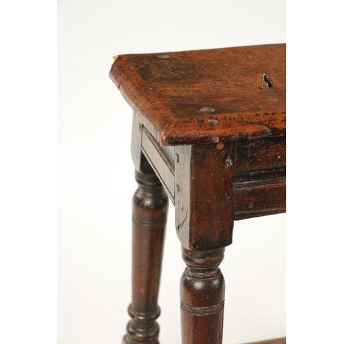 22 - A 17TH CENTURY AND LATER OAK JOINT STOOL WITH POLLARD OAK BURR TOP raised on ring turned supports jo... 