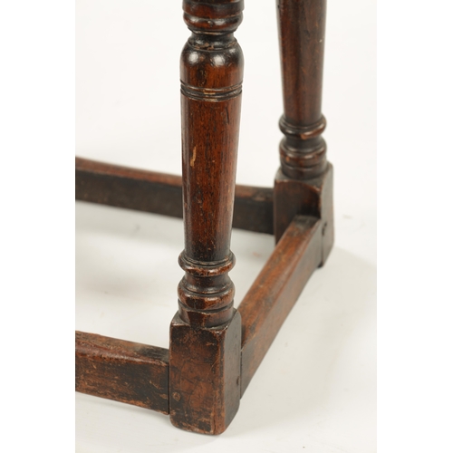 22 - A 17TH CENTURY AND LATER OAK JOINT STOOL WITH POLLARD OAK BURR TOP raised on ring turned supports jo... 