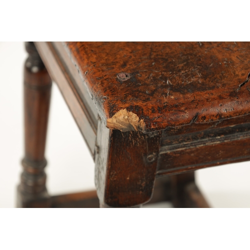 22 - A 17TH CENTURY AND LATER OAK JOINT STOOL WITH POLLARD OAK BURR TOP raised on ring turned supports jo... 