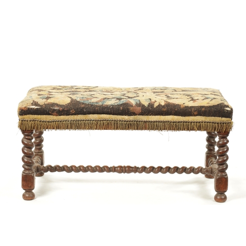 223 - A WILLIAM & MARY OAK BARLEY TWIST STOOL with tapestry upholstered seat. (94cm wide 44cm deep 44cm hi... 