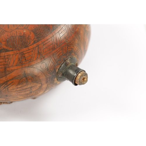 228 - A 19TH CENTURY ENGRAVED GOURD POWDER FLASK (15cm high)