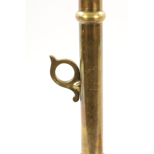 231 - A PAIR OF LARGE 19TH CENTURY BRASS EJECTOR 'PULPIT' BRASS CANDLESTICKS with side handles and spun di... 