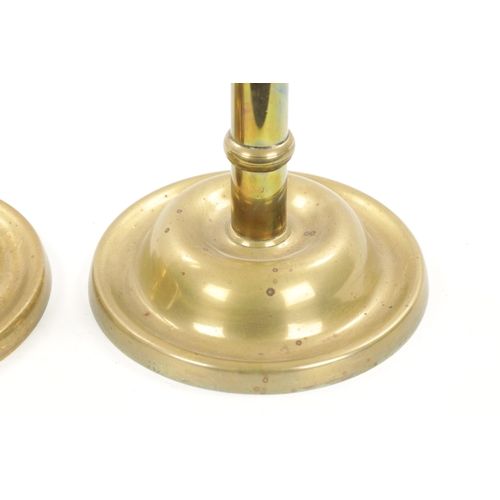 231 - A PAIR OF LARGE 19TH CENTURY BRASS EJECTOR 'PULPIT' BRASS CANDLESTICKS with side handles and spun di... 