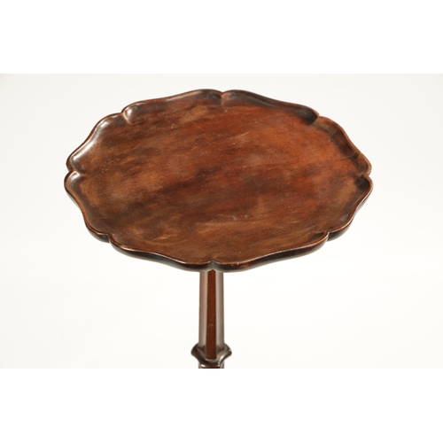 232 - A 19TH CENTURY MAHOGANY CANDLE TABLE with pie crust dished top above a shaped stem with tripod base ... 