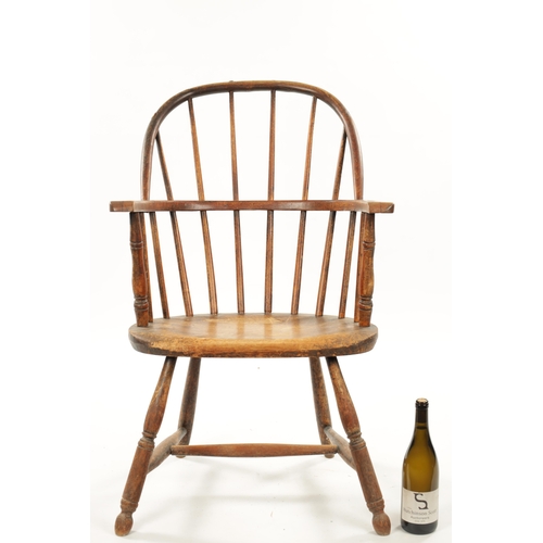 235 - A 19TH CENTURY AMERICAN PRIMITIVE STICK BACK WINDSOR CHAIR with oval seat and ring turned legs. (88c... 