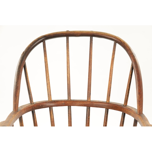 235 - A 19TH CENTURY AMERICAN PRIMITIVE STICK BACK WINDSOR CHAIR with oval seat and ring turned legs. (88c... 