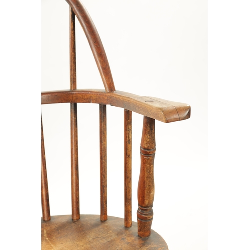 235 - A 19TH CENTURY AMERICAN PRIMITIVE STICK BACK WINDSOR CHAIR with oval seat and ring turned legs. (88c... 