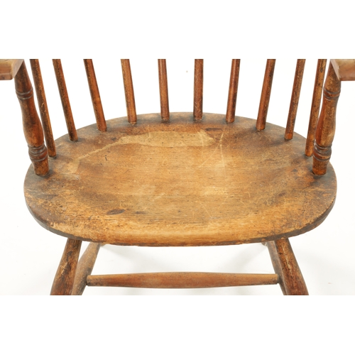 235 - A 19TH CENTURY AMERICAN PRIMITIVE STICK BACK WINDSOR CHAIR with oval seat and ring turned legs. (88c... 