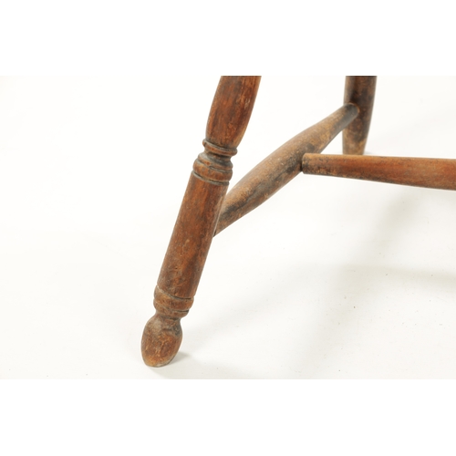 235 - A 19TH CENTURY AMERICAN PRIMITIVE STICK BACK WINDSOR CHAIR with oval seat and ring turned legs. (88c... 