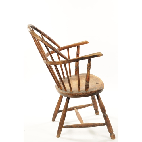 235 - A 19TH CENTURY AMERICAN PRIMITIVE STICK BACK WINDSOR CHAIR with oval seat and ring turned legs. (88c... 