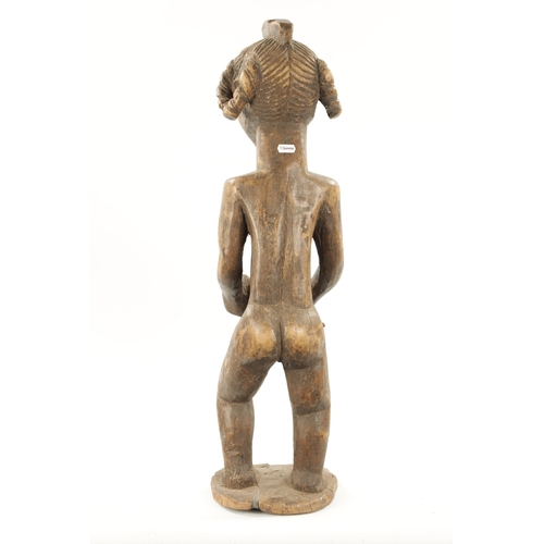 238 - AN ANTIQUE NATIVE CARVED HARDWOOD FIGURE OF LADY WITH CHILD (72cm high)