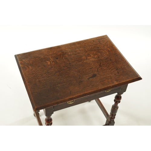 242 - A SMALL 17TH CENTURY OAK SIDE TABLE with frieze drawer and ring turned legs (68cm wide 46cm deep 69c... 