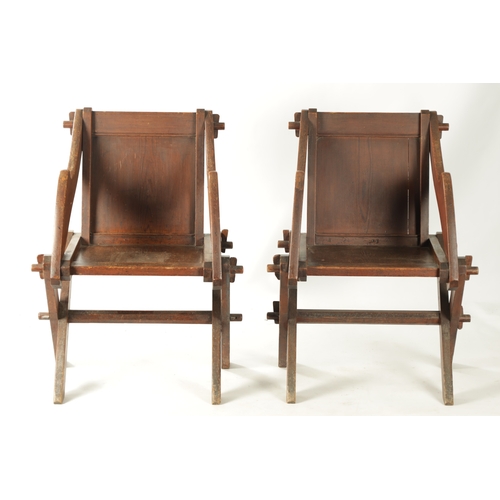 243 - A PAIR OF LATE 18TH CENTURY PITCH PINE GLASTONBURY CHAIRS with x frame supports. (65cm wide 87cm hig... 