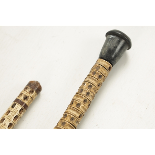 249 - TWO 19TH CENTURY SHARK VERTEBRAE WALKING STICKS with hook handle and turned bone pommel (Both 91cm l... 