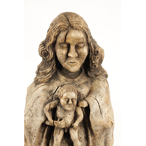 25 - AN ANTIQUE FOLK ART ROOT-WOOD CARVING OF A MOTHER AND CHILD (61cm high)